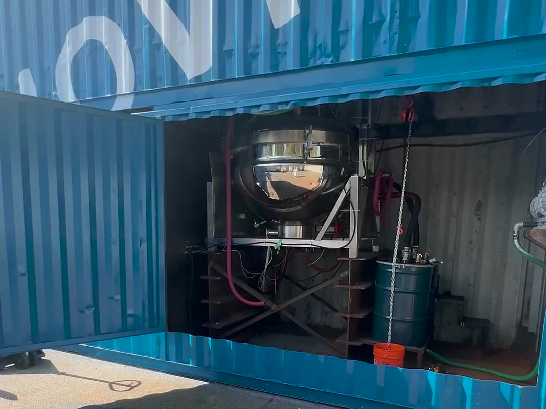 Denovia processing equipment inside a branded shipping container